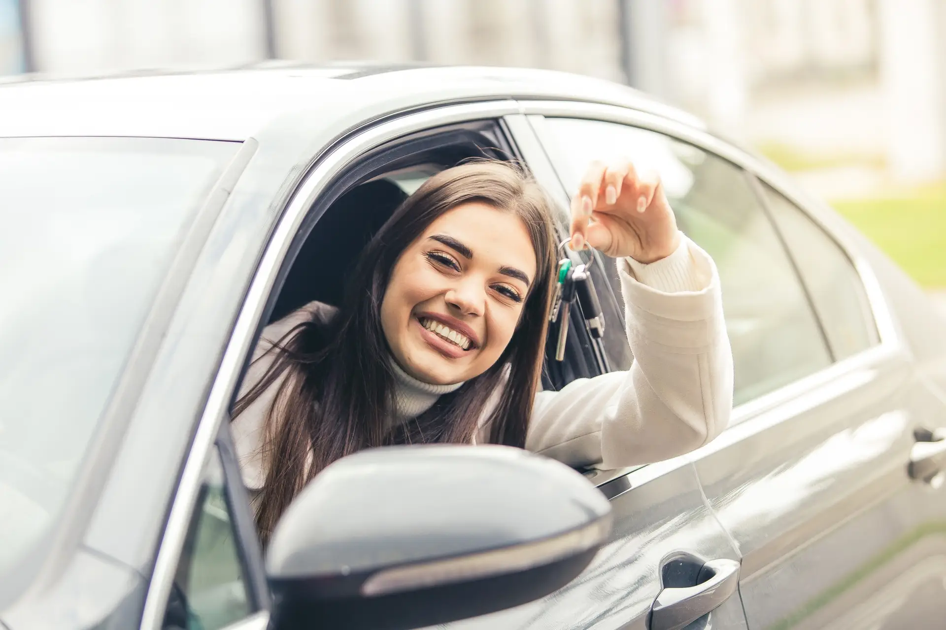 Girl in car with keys