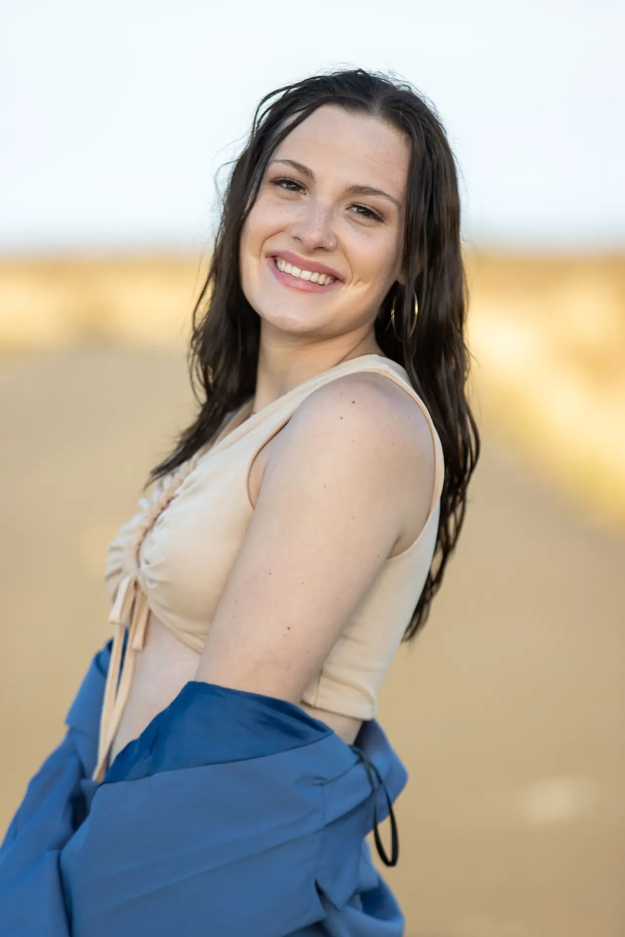 Young brunette woman outside